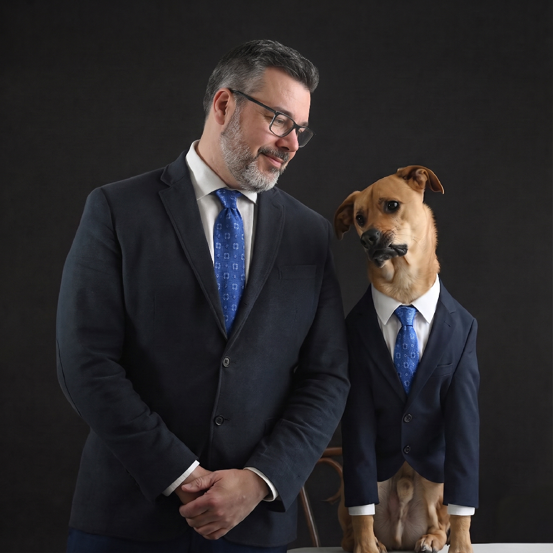 Eric Rounds, founder and principal, with Tucker.